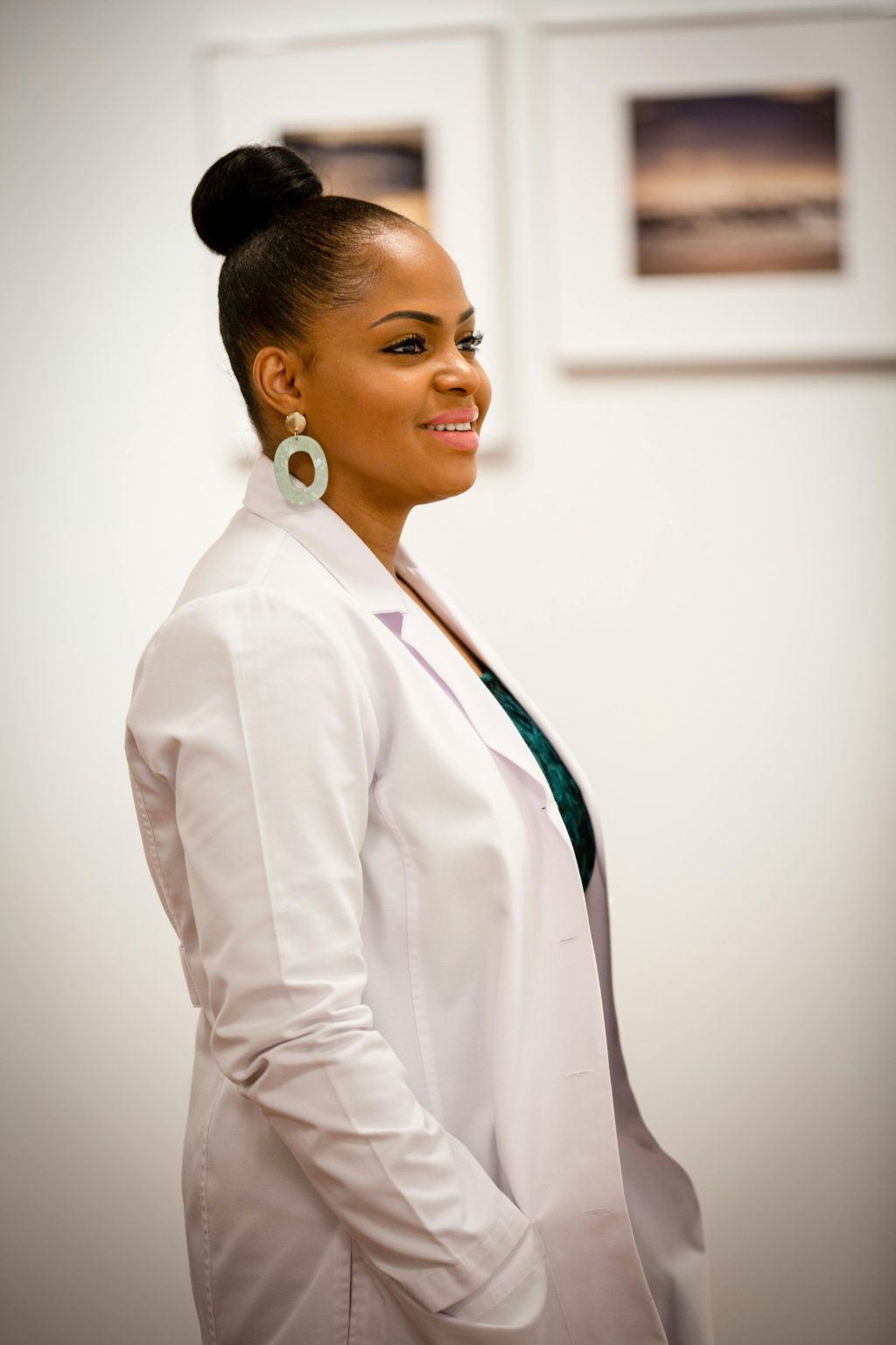 Image of a professional Black woman in a white blazer.